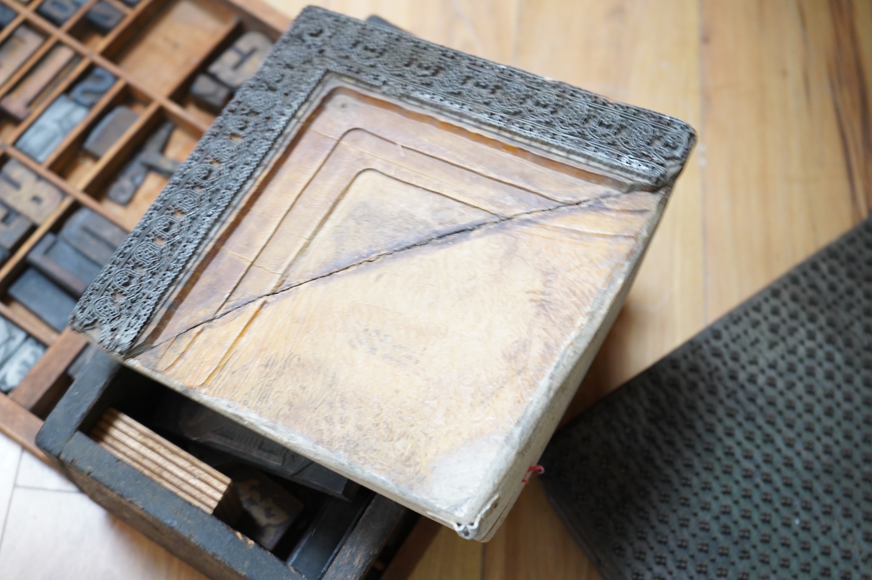 A printer's tray and various type-sets
